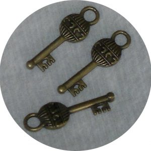 Ключе сребристо,медено,зелено 18х22мм