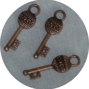 Ключе сребристо,медено,зелено 18х22мм